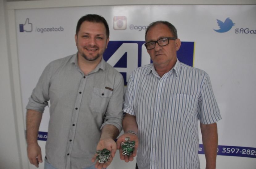 Cleoni e Mauri firmaram parceira entre Rotary e AG para arrecadar aneis de latas e reverter em cadeiras de rodas